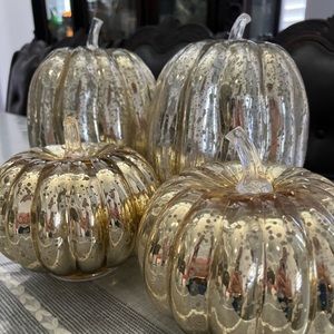 4 Gold Lightup pumpkins.